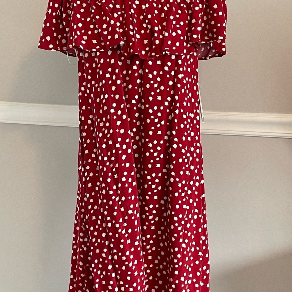 Red and white polka dot dress.